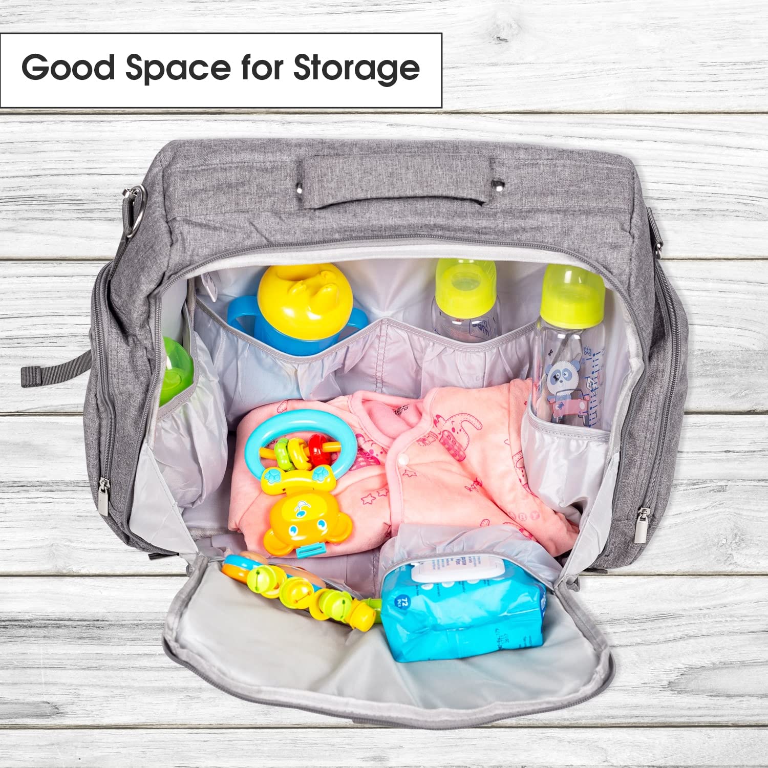 Front view of a blue textured messenger-style diaper bag with various compartments and a Mee Mee brand label. www.usmile.toys